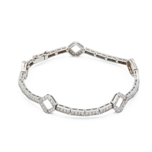 Pulsera semirígida de oro blanco y diamantes - 1210 Pulsera realizada en oro blanco de 18k con pequeñas piezas rectangulares enl