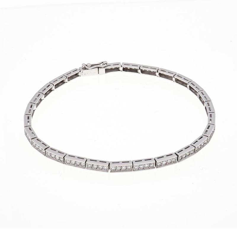 Pulsera semirígida de oro blanco y diamantes Pulsera semirígida realizada en oro blanco de 18k con diamantes