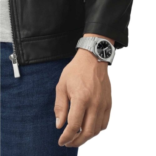 Tissot  PRX - T137.410.11.051.00 Reloj en caja de acero de 40mm, mecanismo suizo de cuarzo, esfera negra, ventana con indicación