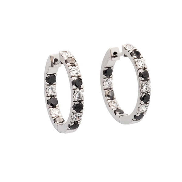Pendientes criollas de oro blanco con brillantes negros y blancos Criollas en oro blanco engastadas con 14 brillantes negros (0.