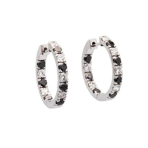 Pendientes criollas de oro blanco con brillantes negros y blancos Criollas en oro blanco engastadas con 14 brillantes negros (0.