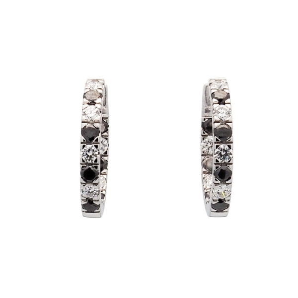 Pendientes criollas de oro blanco con brillantes negros y blancos Criollas en oro blanco engastadas con 14 brillantes negros (0.